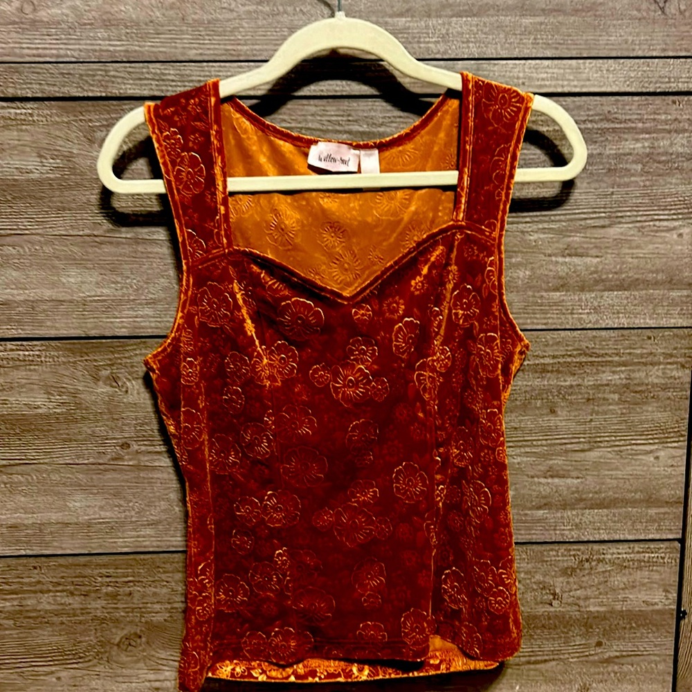 Rust colored tank from the buckle.